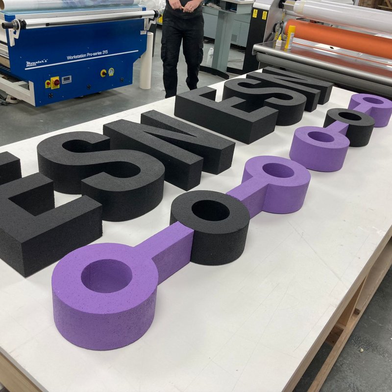 Large cut letters office signage being produced in the UK Sign Shop workshop