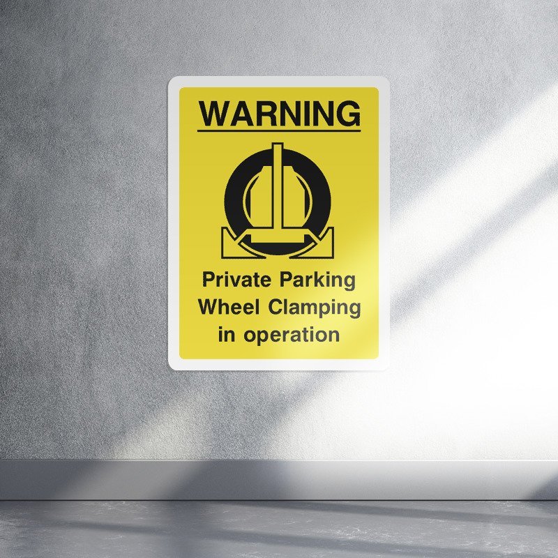 Warning private parking wheel clamping in operation security sign - portrait
