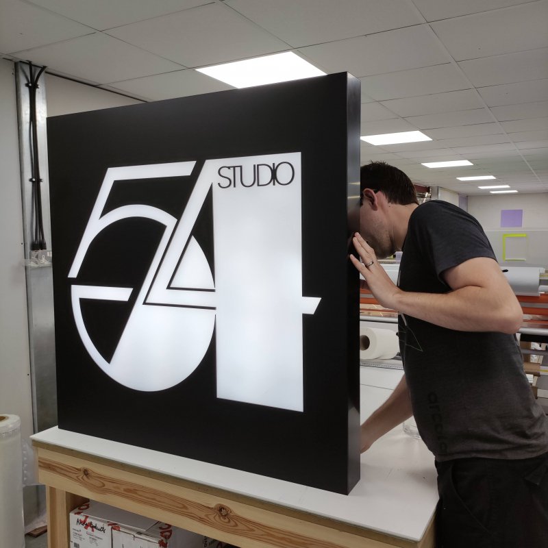 Illuminated Aluminum Tray Sign LED being checked in the UK Sign Shop workshop