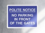 Polite notice no parking in front of these gates sign landscape
