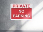 Private no parking access sign