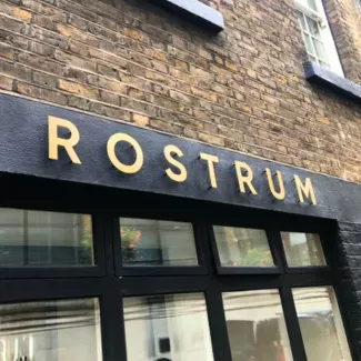 Rostrum wall sign gold lettering