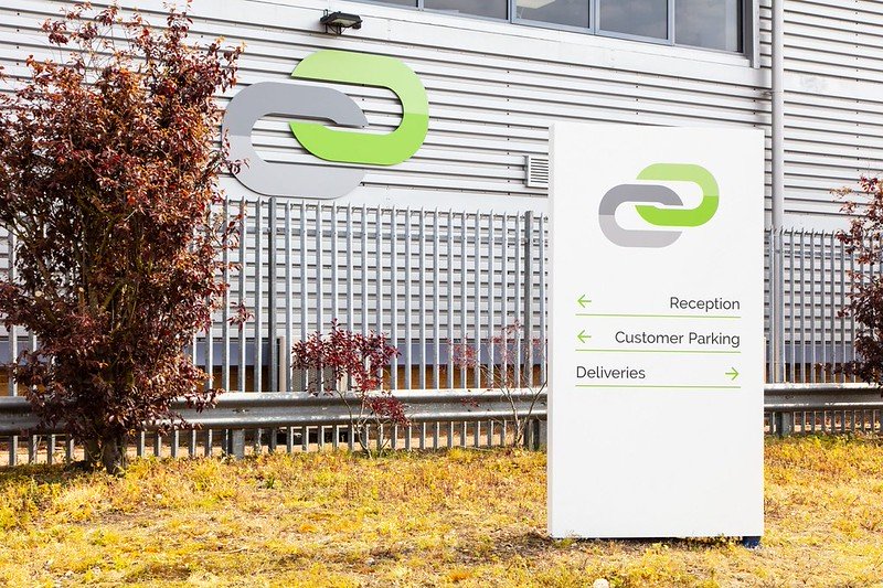 External office building wall mounted sign and totem monolith